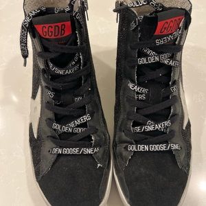 High top Glittery black w/ silver & gold trimming. Perfect condition.